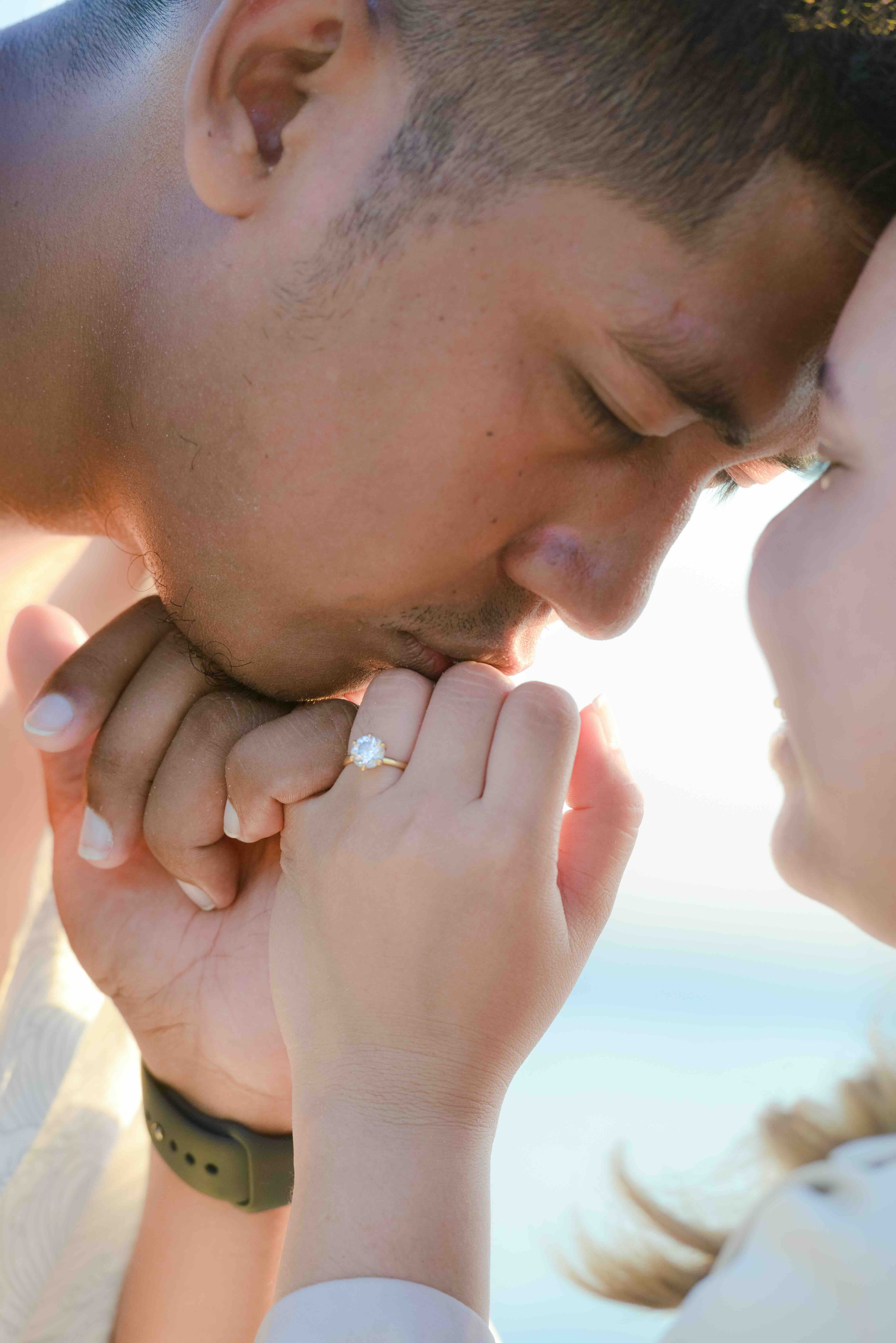 Lloyd kissing Jewel's hand